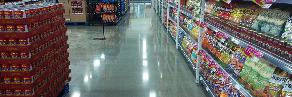 Grocery store isle, polished concrete flooring.